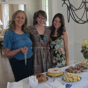 Party planners Dorothy Copps, Mari Andrew, and Karen MacDonald prepare to welcome guests to a L'Arche party. Photo by Bethany Keener